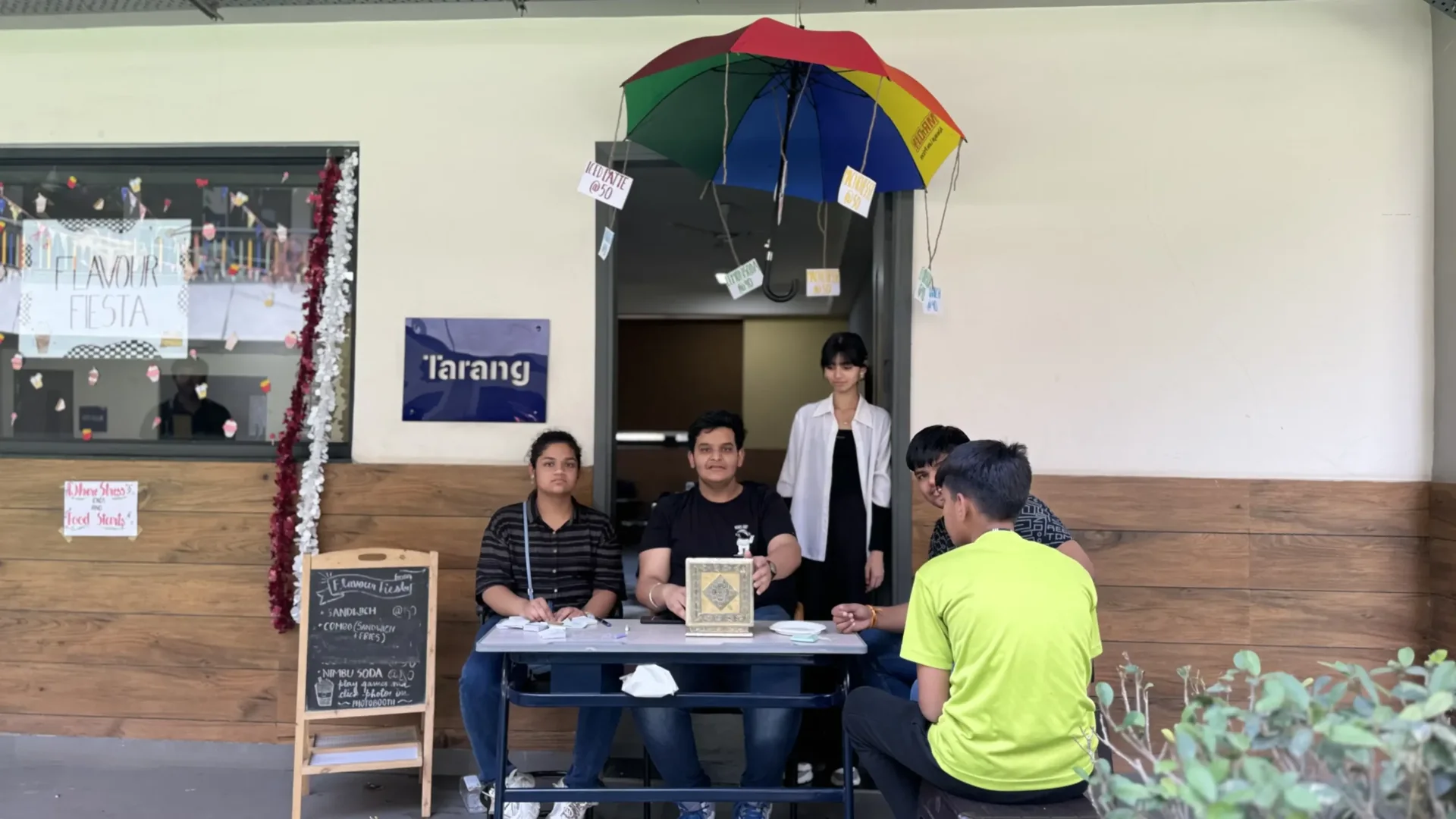 Senior students managing a food stall during a school event at Manaskriti School Faridabad