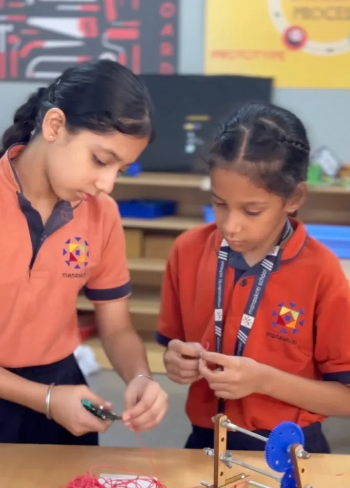 Students working on a technology project in the Maker’s Lab at Manaskriti School Faridabad