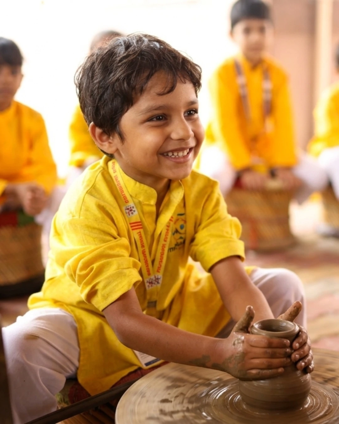 Students participating in a pottery activity at Manaskriti School Faridabad