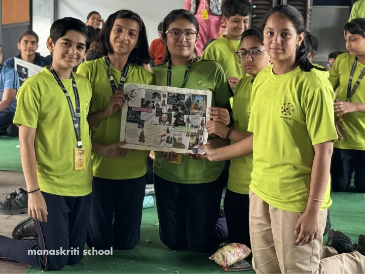 Students presenting a creative project at Manaskriti School Faridabad