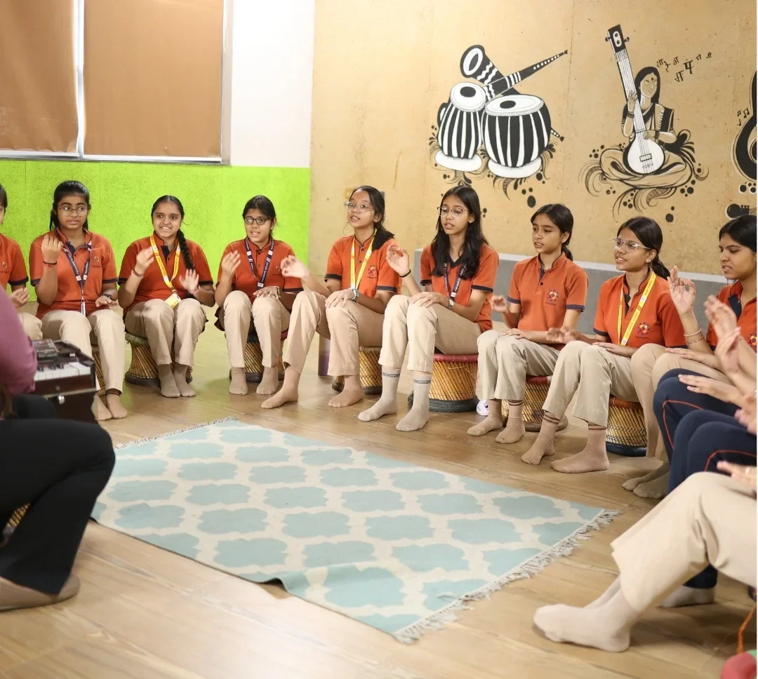 Students participating in a music class at Tarang in Manaskriti School Faridabad