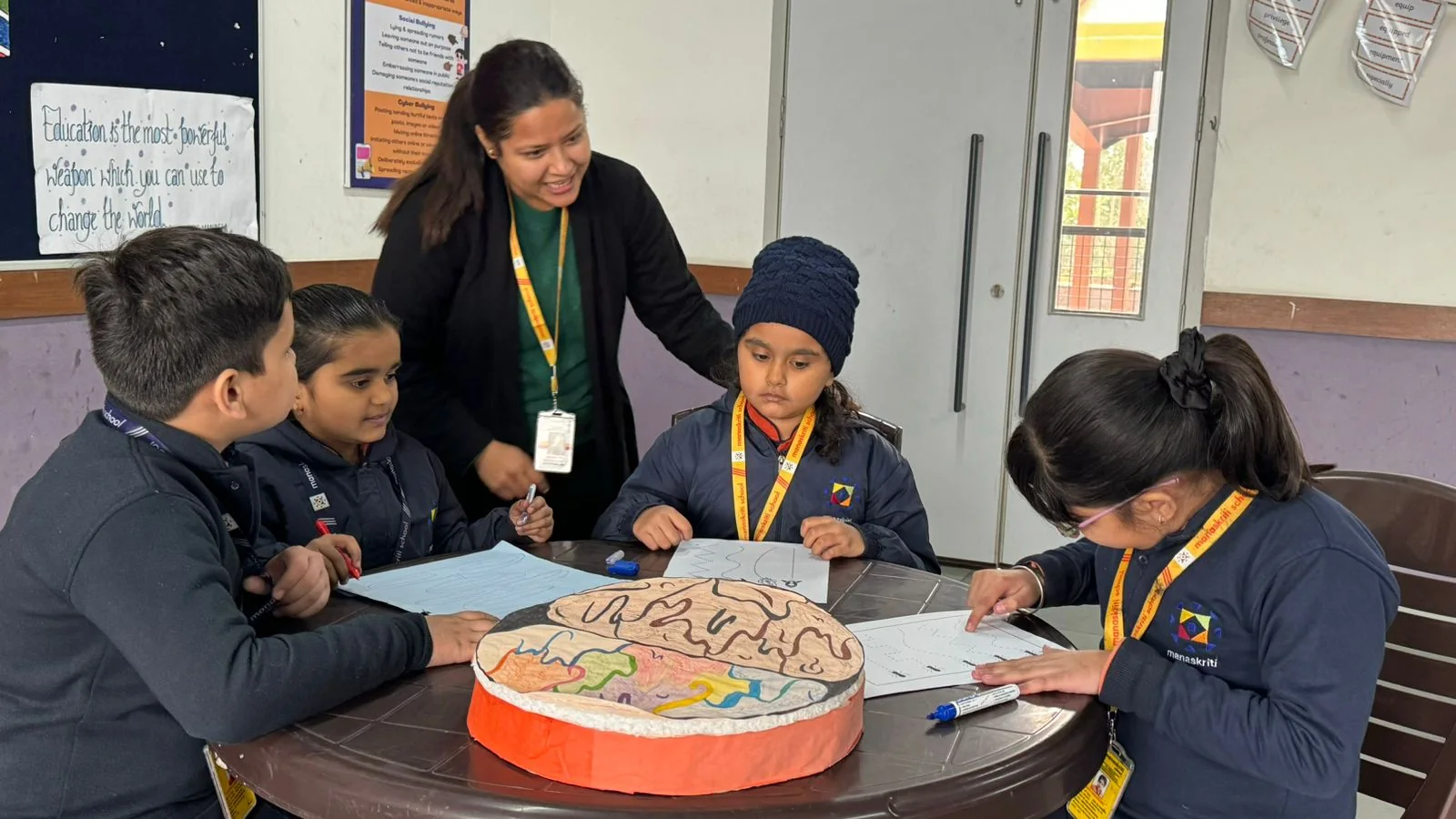 Students participating in an active classroom learning activity at Manaskriti School Faridabad