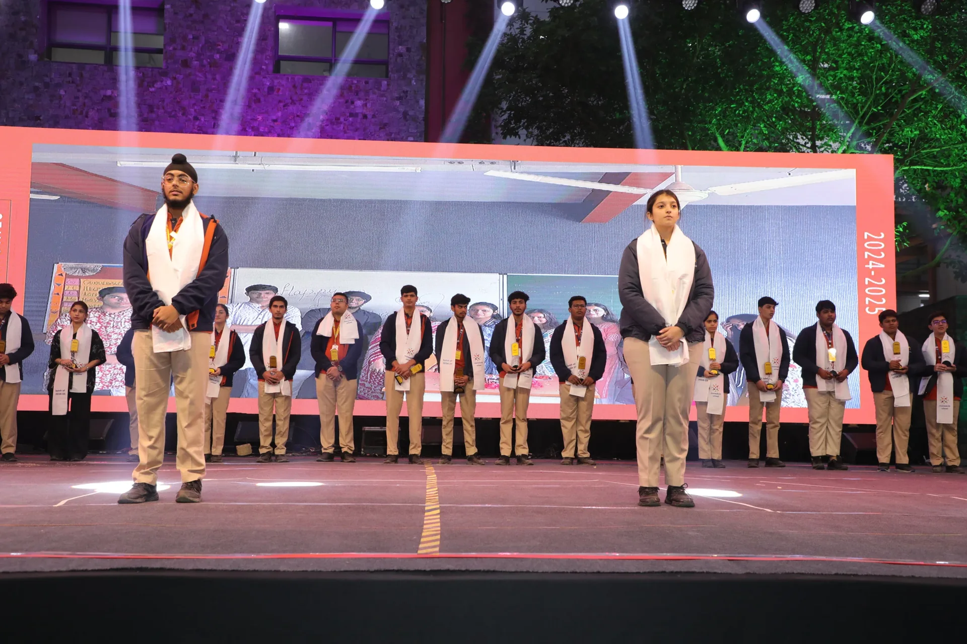 Senior students participating on stage during an event at Manaskriti School Faridabad